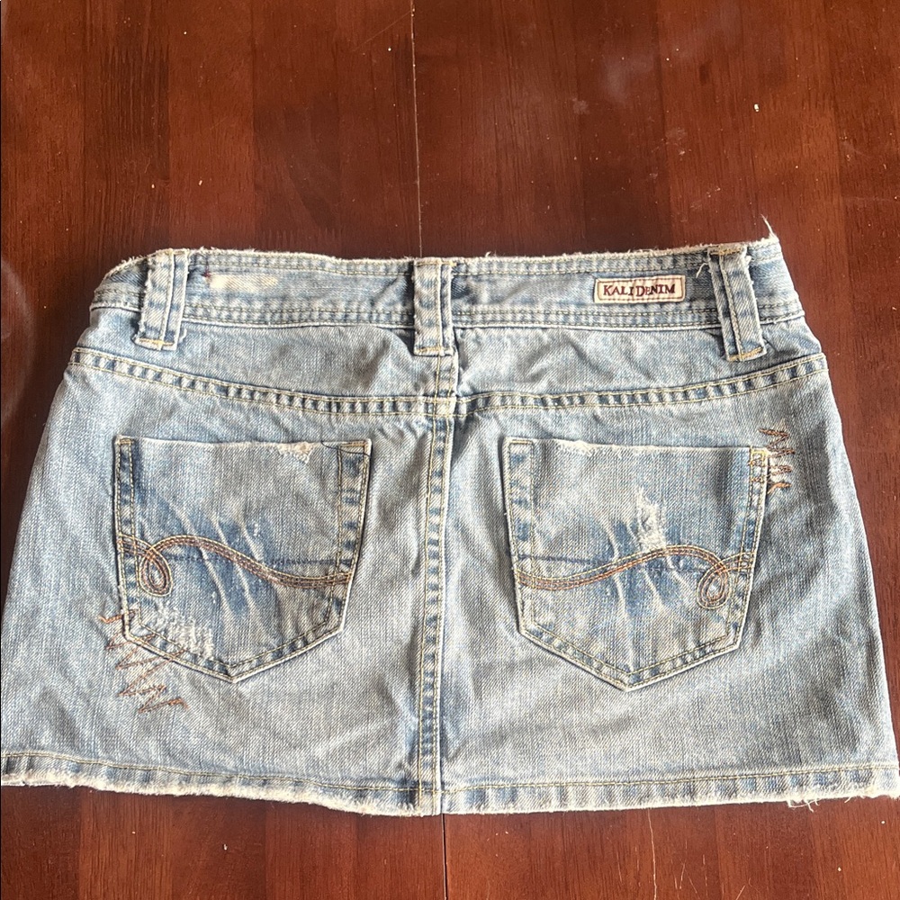 Kali Light Blue Distressed Denim Mini Skirt
